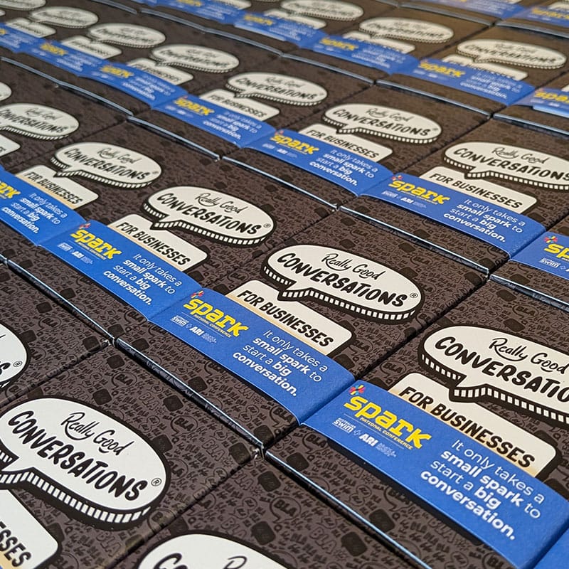 Spark Conference co-branded packs laid out